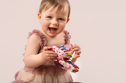 Kinderfoto Tortenfoto smash the cake Geburtstag Geburtstagsfoto Luftballon Kind erster Geburtstag Gloggnitz Neunkirchen