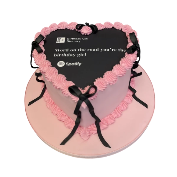 Bespoke cake with intricate floral designs and elegant piping, crafted for celebration in Solihull, West Midlands.