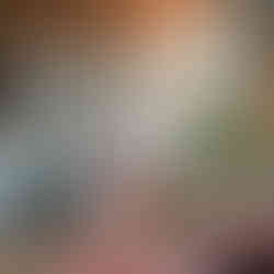 A bold tablescape with patterned place settings and colorful wedding flowers in Austin, TX.