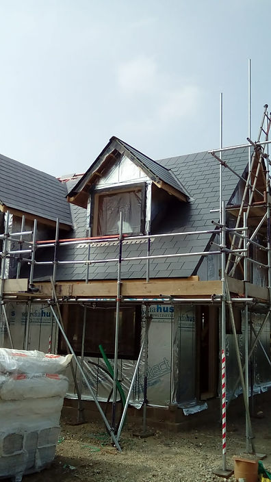 house renovation, new roof and more by JTS Roofing & Building Ltd