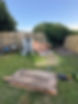 Garden clearance in progress with old furniture, wooden fencing and household items removed by MB Removals in Torquay.