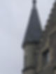 Aerial view of various roofing styles in the UK, showcasing traditional and modern designs across residential buildings