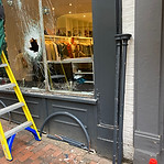 broken shop front glass
