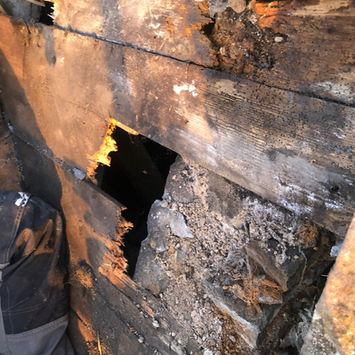 Severely decayed and rotting structural roof timber beams