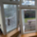 An open doubled glazed bedroom window
