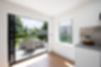 open patio door from kitchen to garden