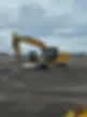 yellow Gwm Earthworks Ltd machine on a construction site, great for plant hire