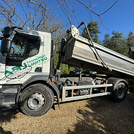A truck being used to supply aggregate.