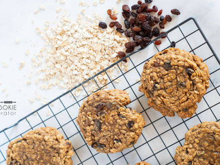 Close-up of chewy oatmeal cookie with oats and raisins baked throughout
