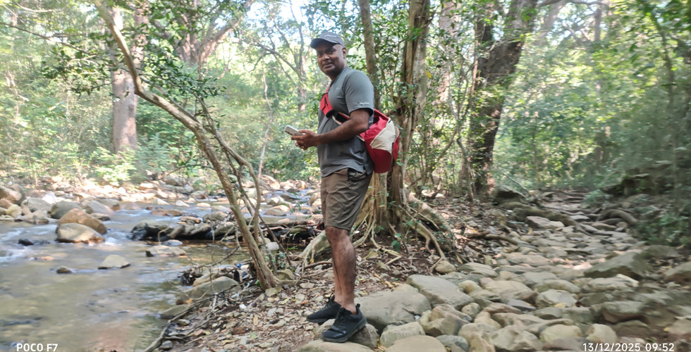 Mid trek break for photoshoot by the stream