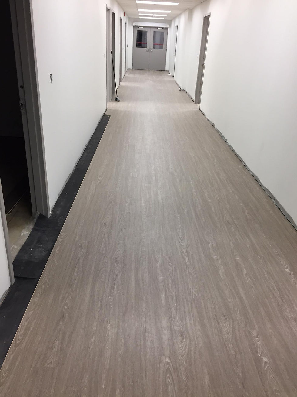 Hardwood flooring installed in Durham retail space – finished look
