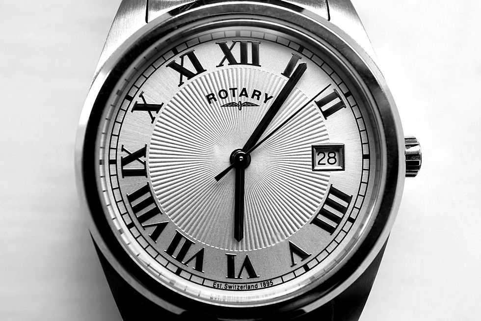 Close-up view of a vintage watch dial showing intricate details