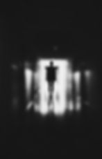 silhouette of single person in hallway