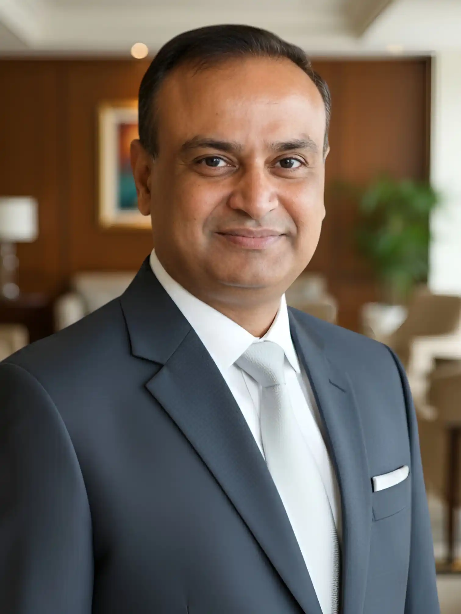 Tarsem Garg, Founder of GFM Resorts, standing with a warm and confident smile at the luxurious wedding resort in Tricity. Showcasing the vision behind one of the best wedding resorts near Chandigarh, Zirakpur, Ambala, Panchkula, Mohali and Lalru — representing leadership, hospitality, and legacy at GFM Resorts.