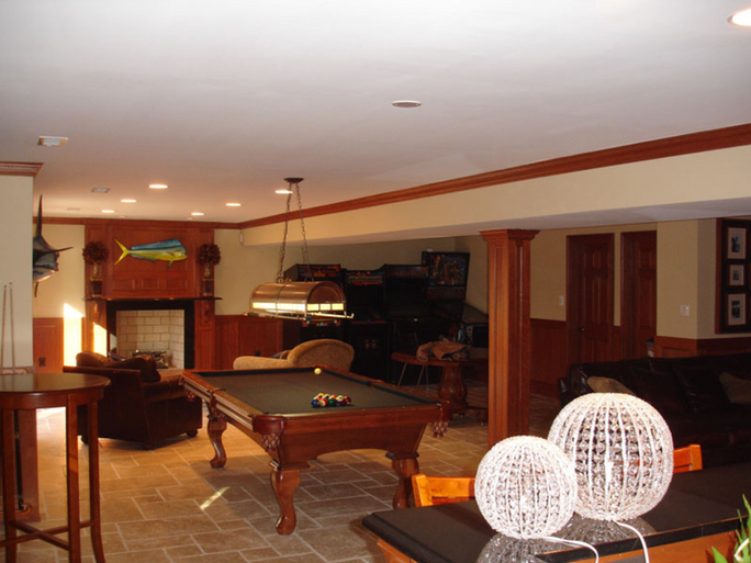 Moody basement with wood accents and large tile