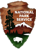 The National Park Service logo. 