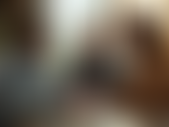 Young couple meeting with local insurance agent in a bright Las Vegas office to review coverage options.