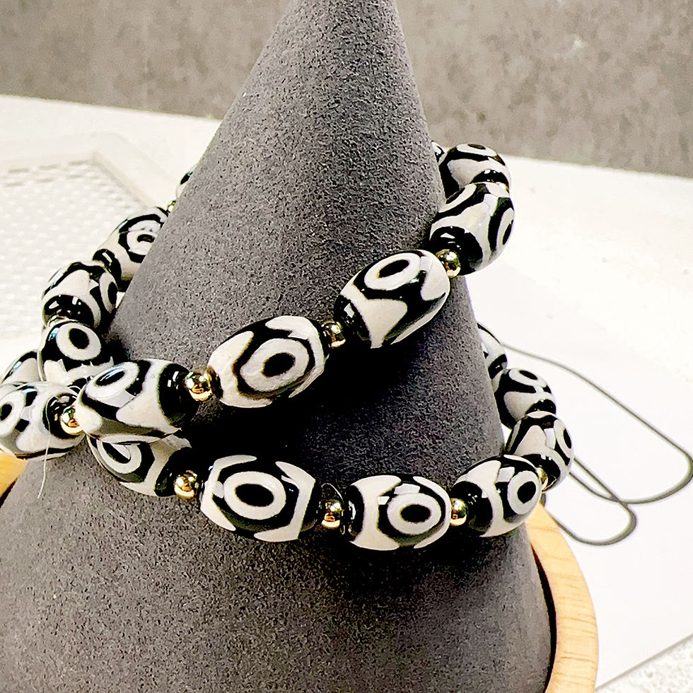 Thumbnail: Attractor 3 eyed Dzi Bead Bracelet