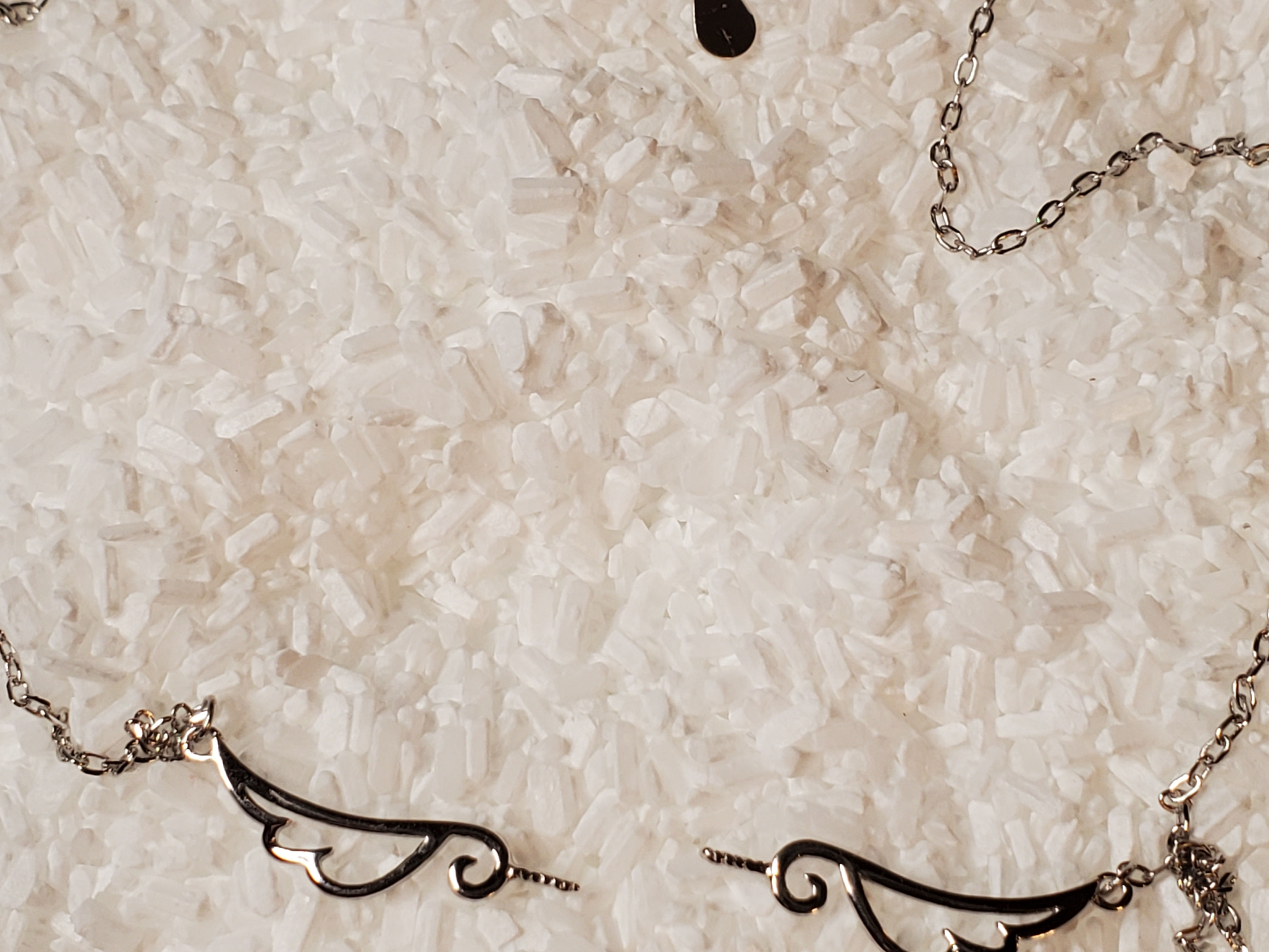 Sterling silver angel wing necklace mount.