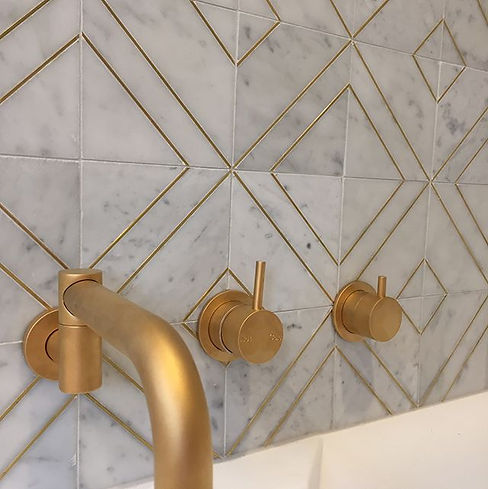 24 carat gold taps. 150x150 Carrara marble with brass insert.jpg