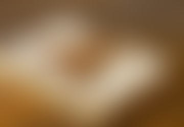 Autumn-themed table with a notebook symbolizing reflection on living every moment in Jesus’ name”