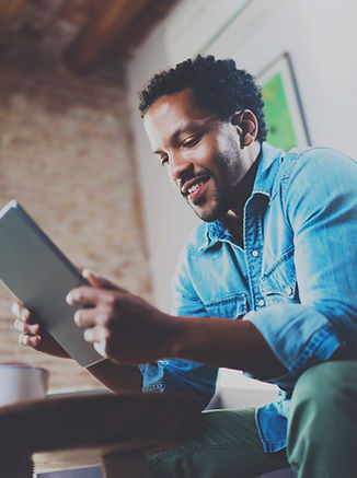 Man using tablet, representing content marketing services