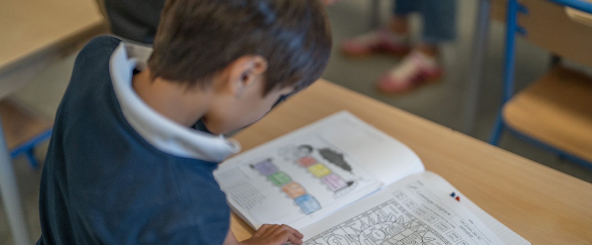 Boy doing his class work