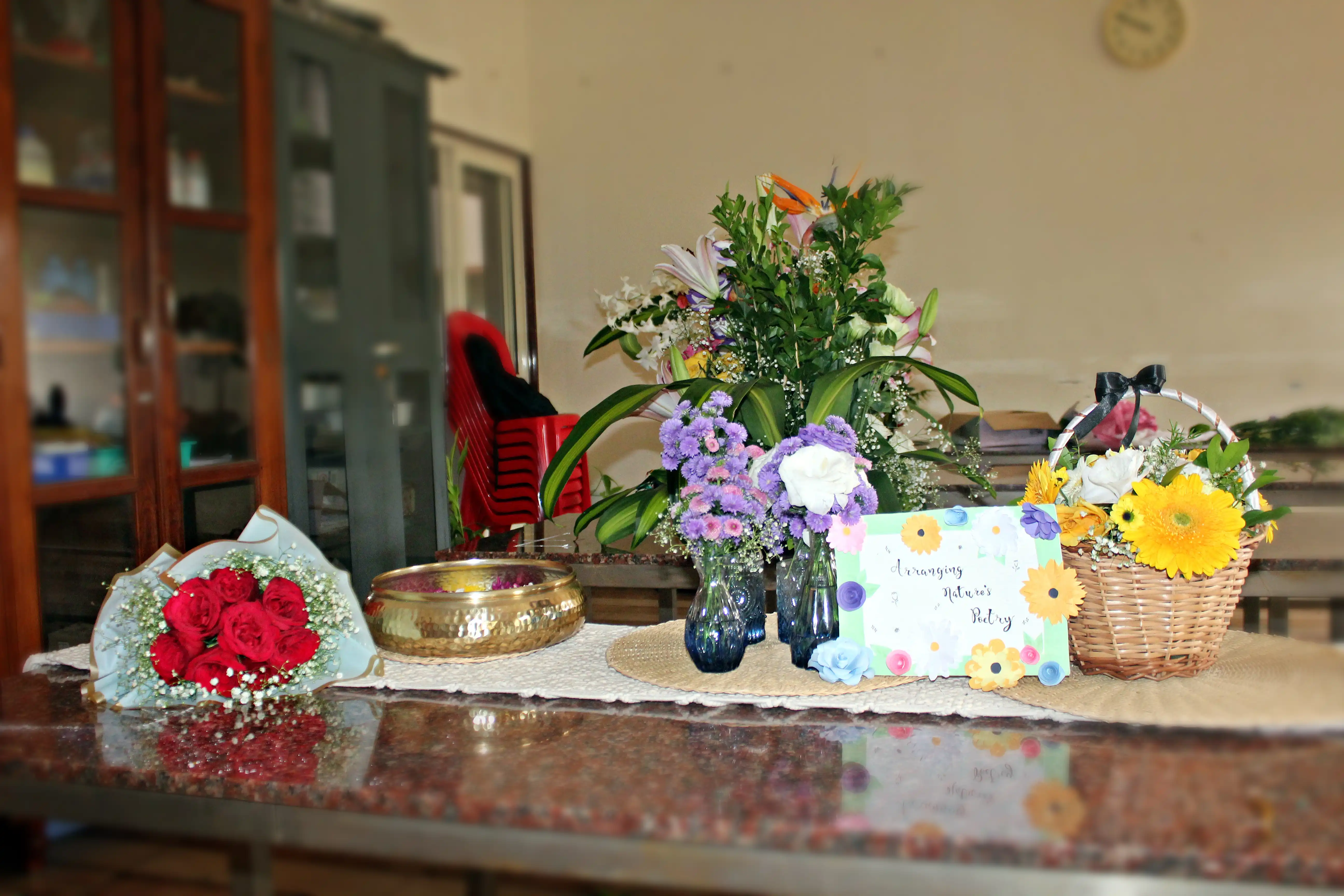 Colourful flowers arranged creatively by students