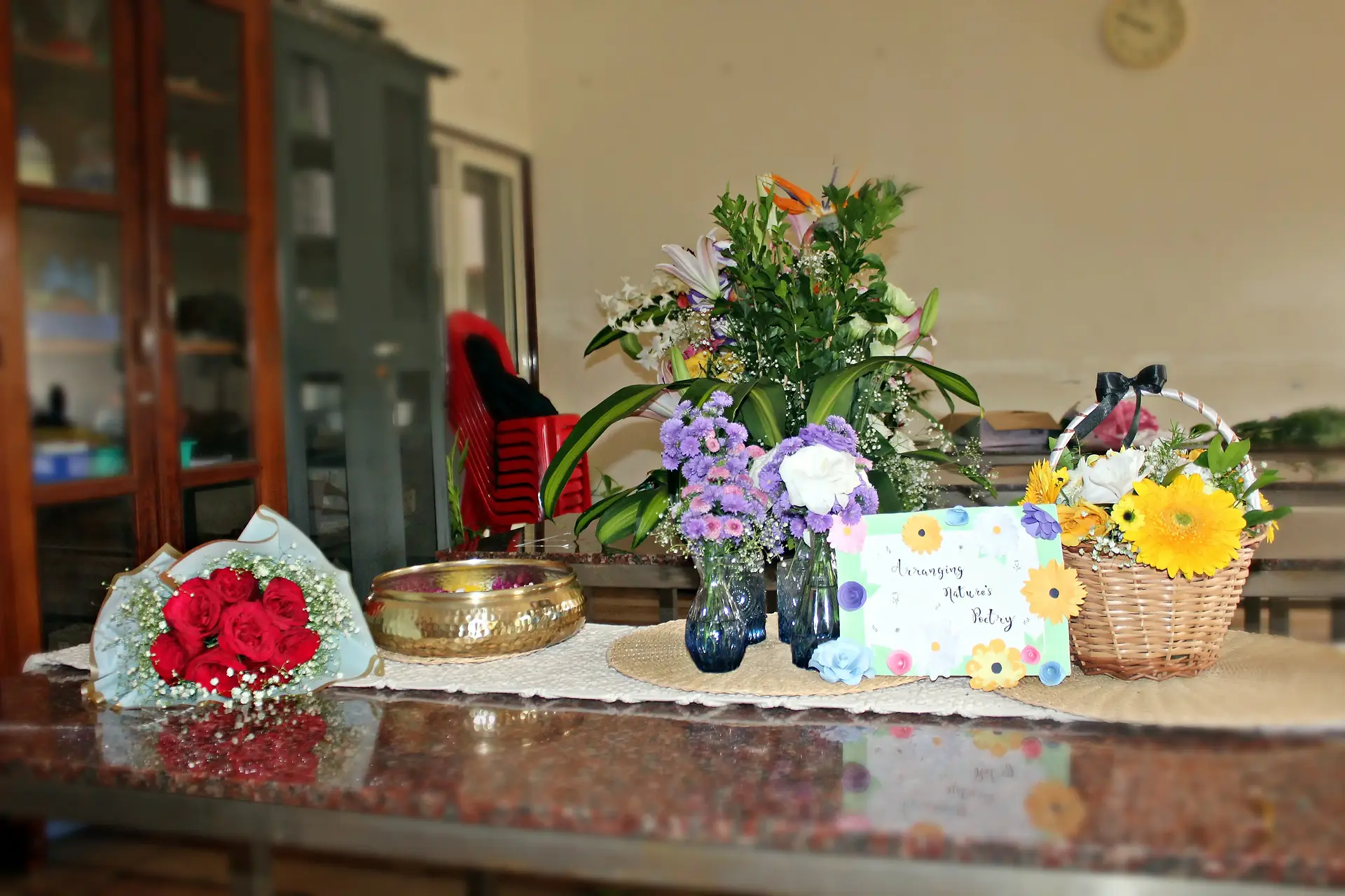Colourful flowers arranged creatively by students