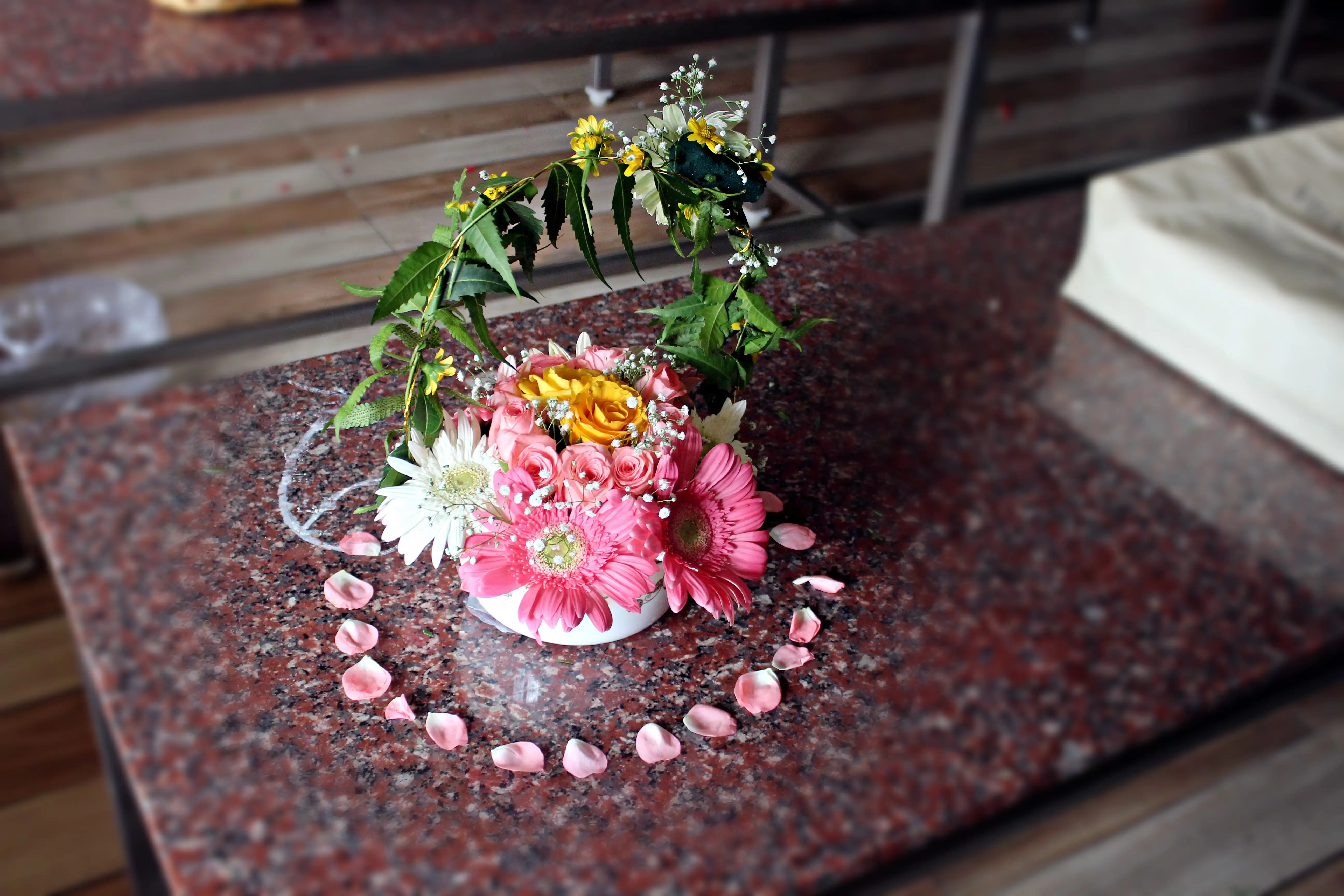 Colourful flowers arranged creatively by students