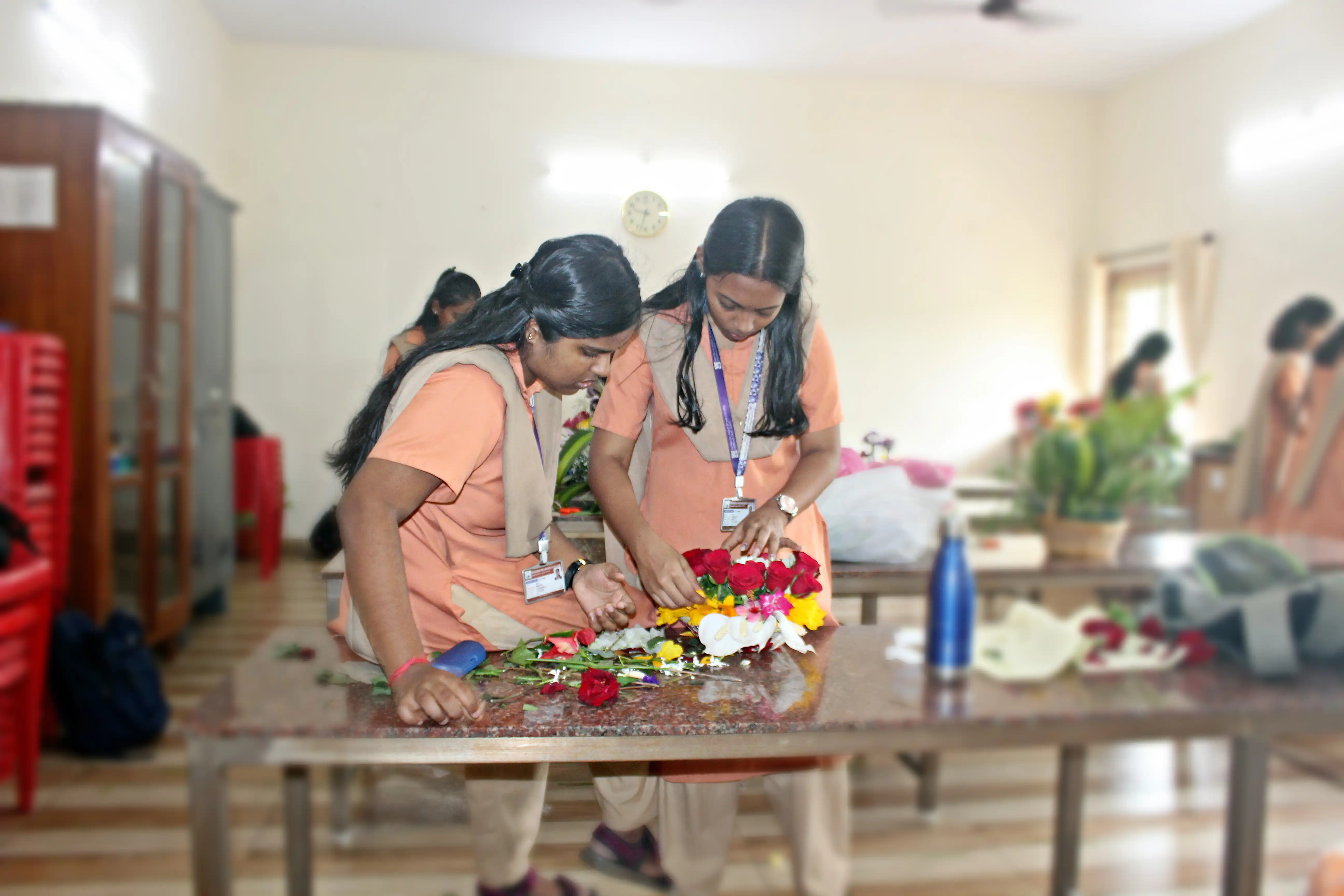 Students arranging flowers during the Flower Arrangement Competition