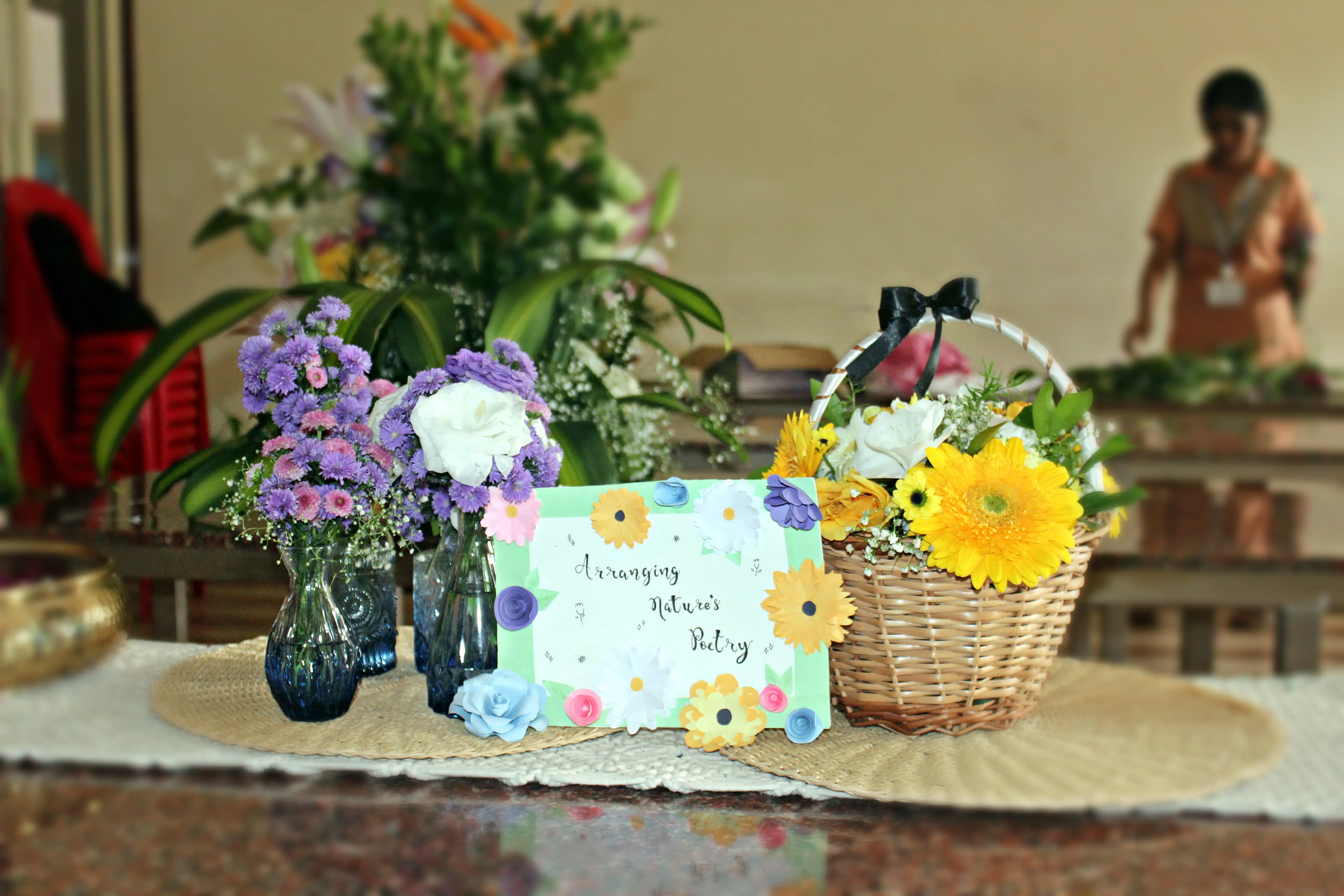 Colourful flowers arranged creatively by students