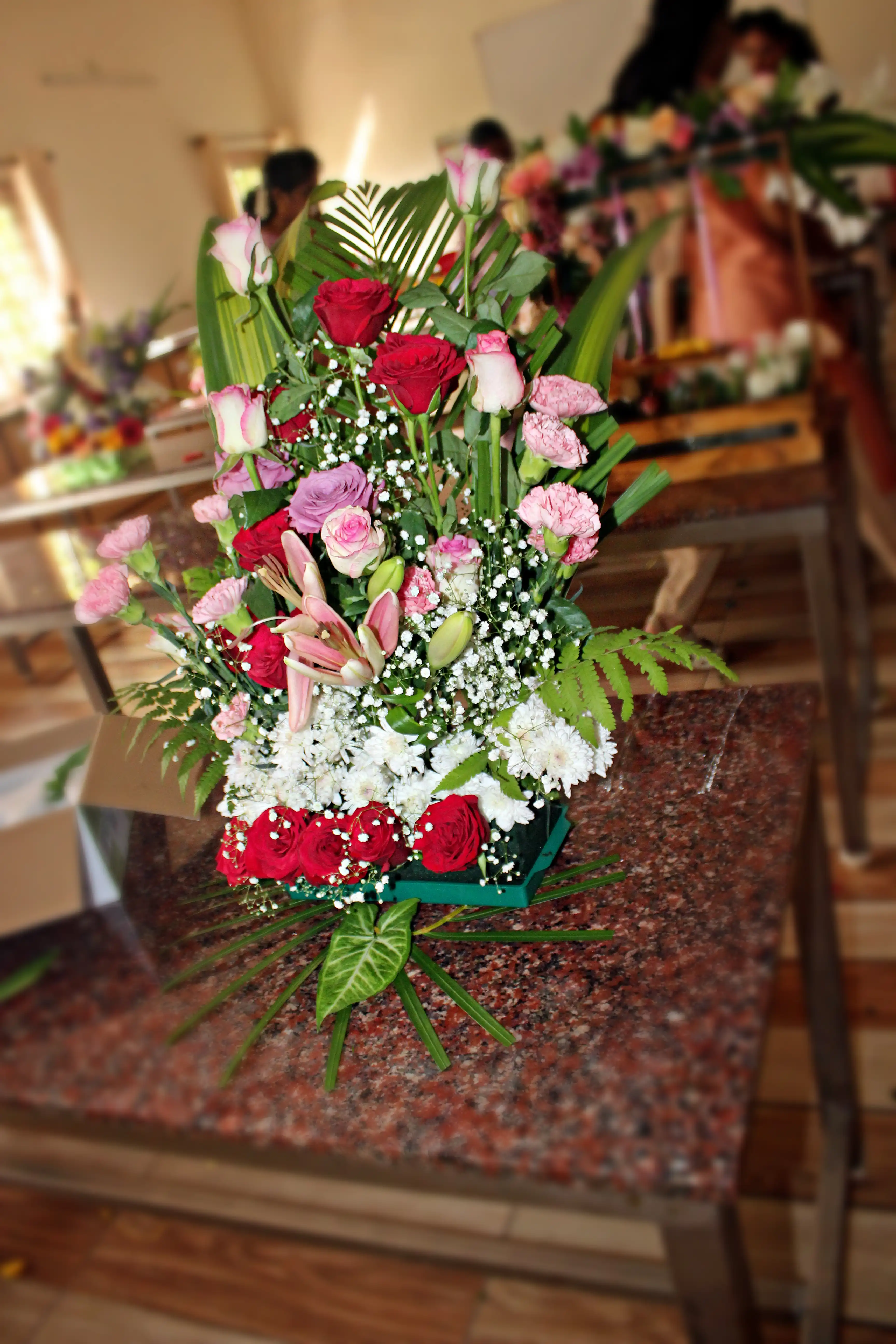 Colourful flowers arranged creatively by students