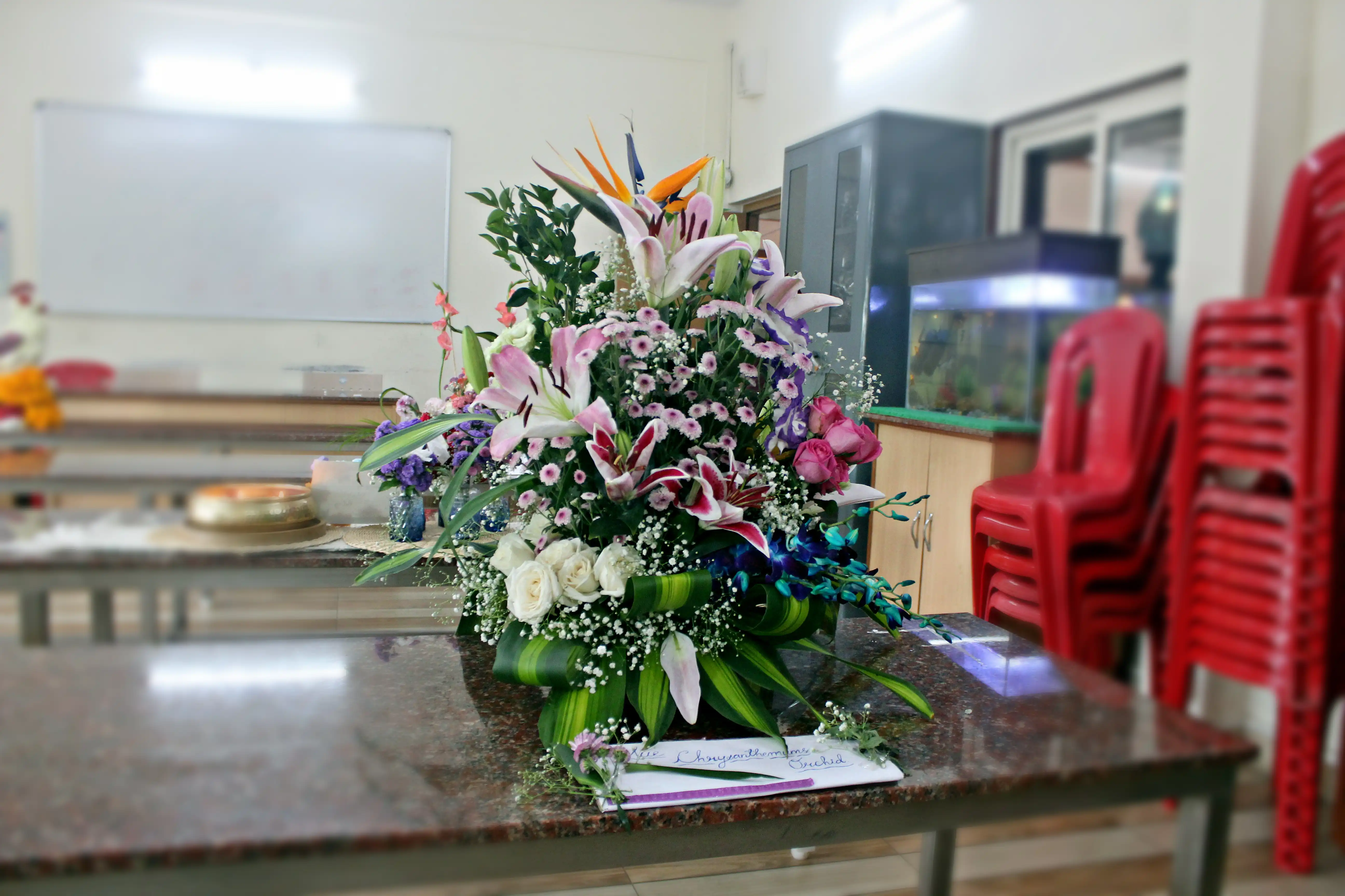 Colourful flowers arranged creatively by students