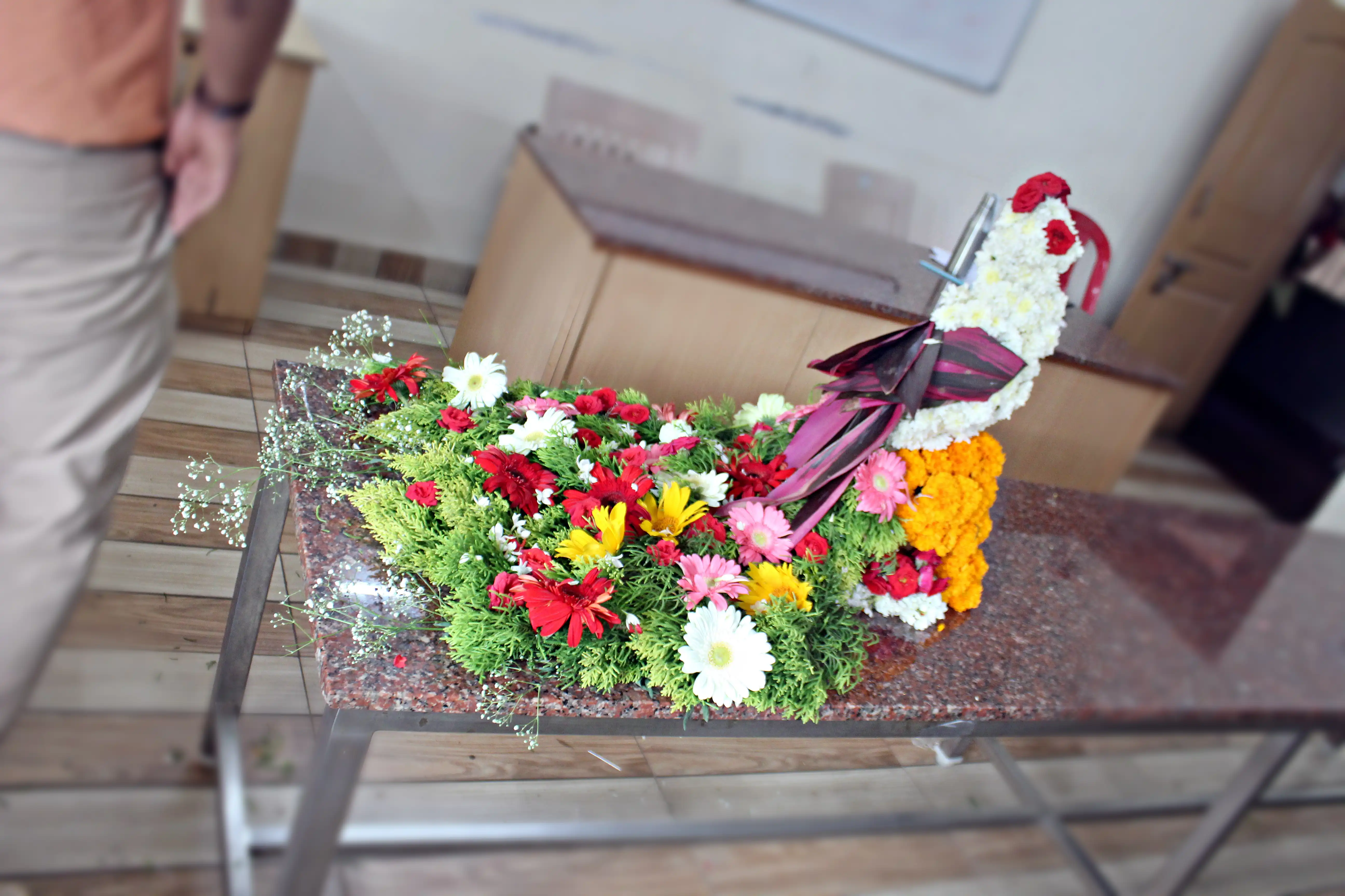 Colourful flowers arranged creatively by students