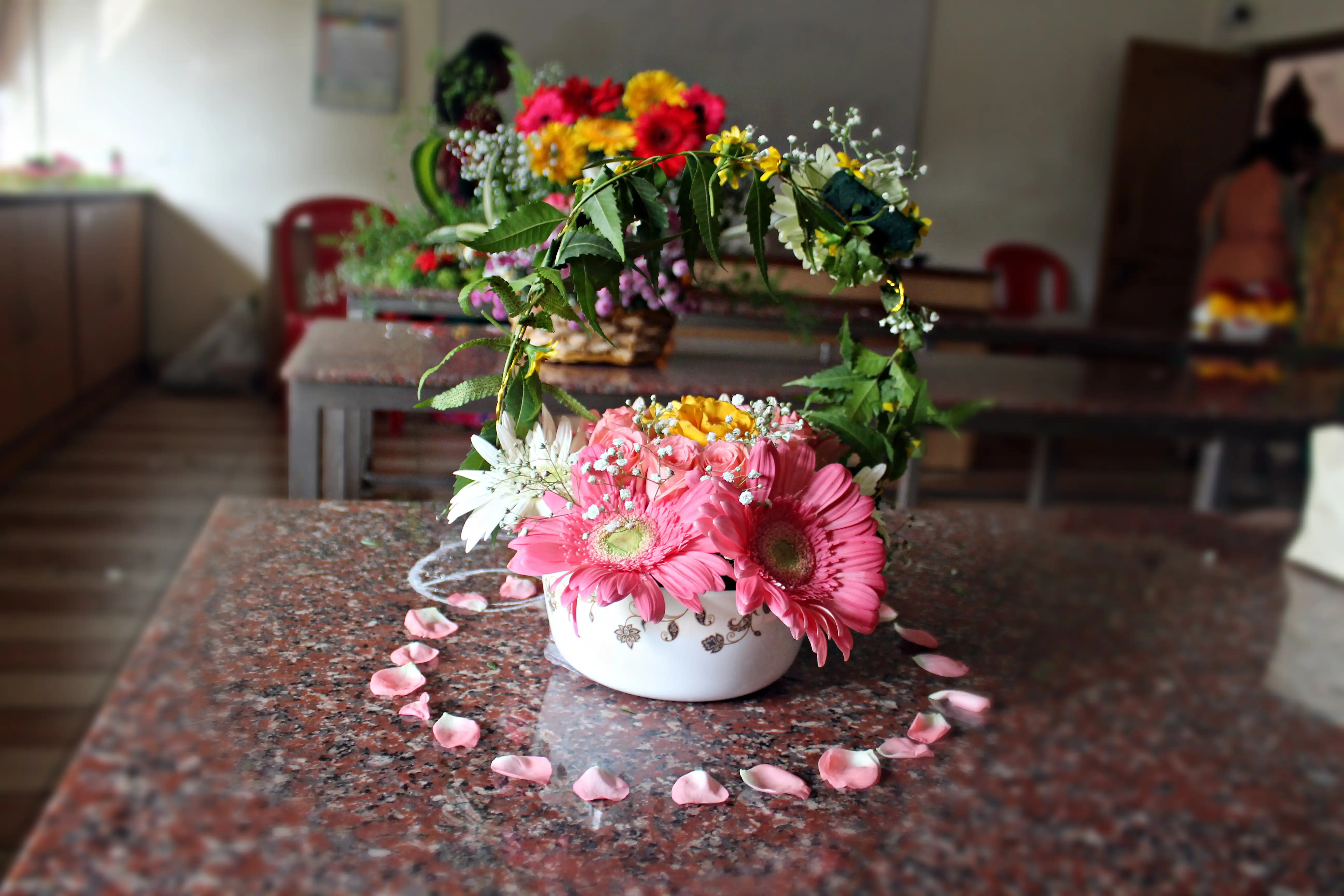 Colourful flowers arranged creatively by students