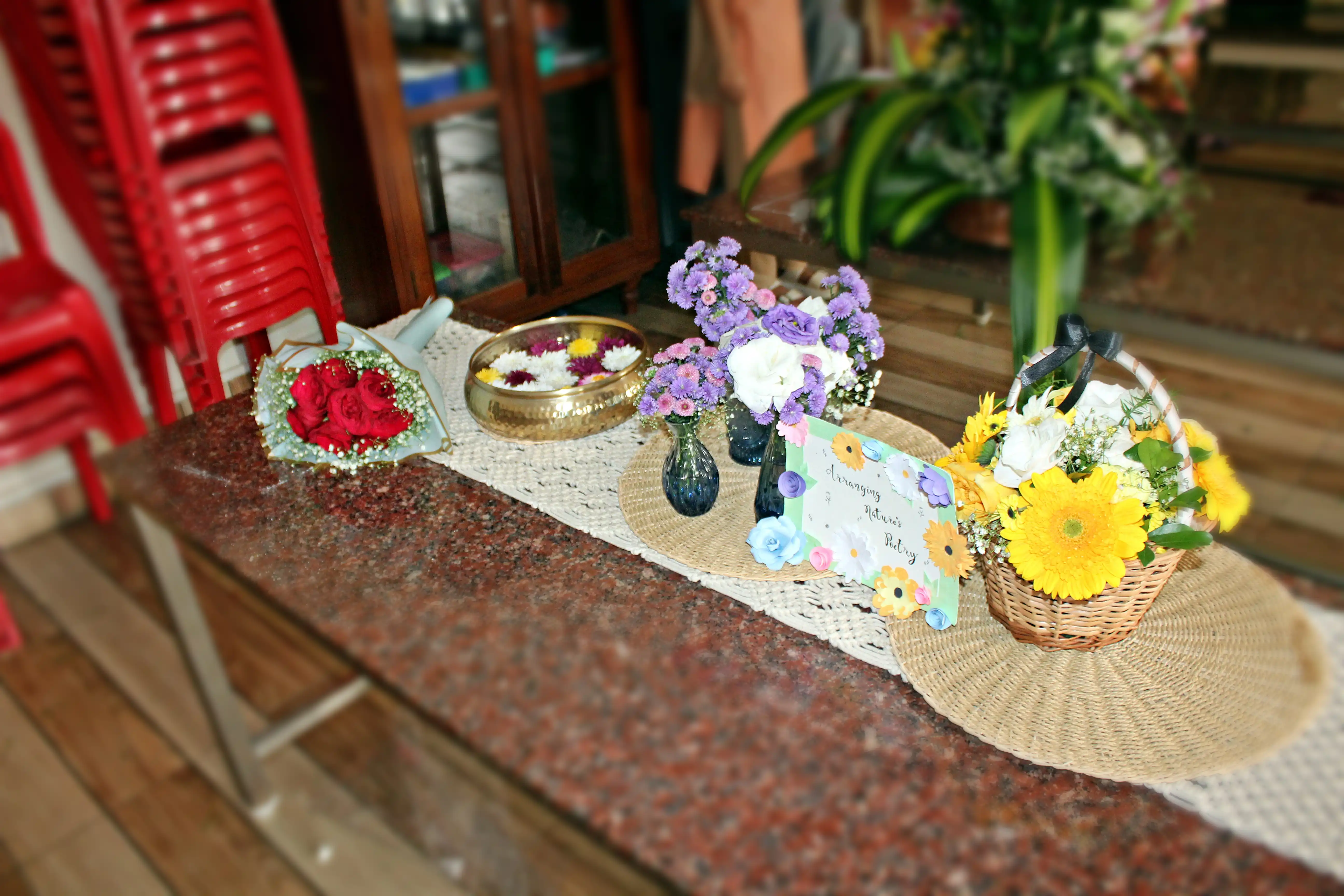 Colourful flowers arranged creatively by students