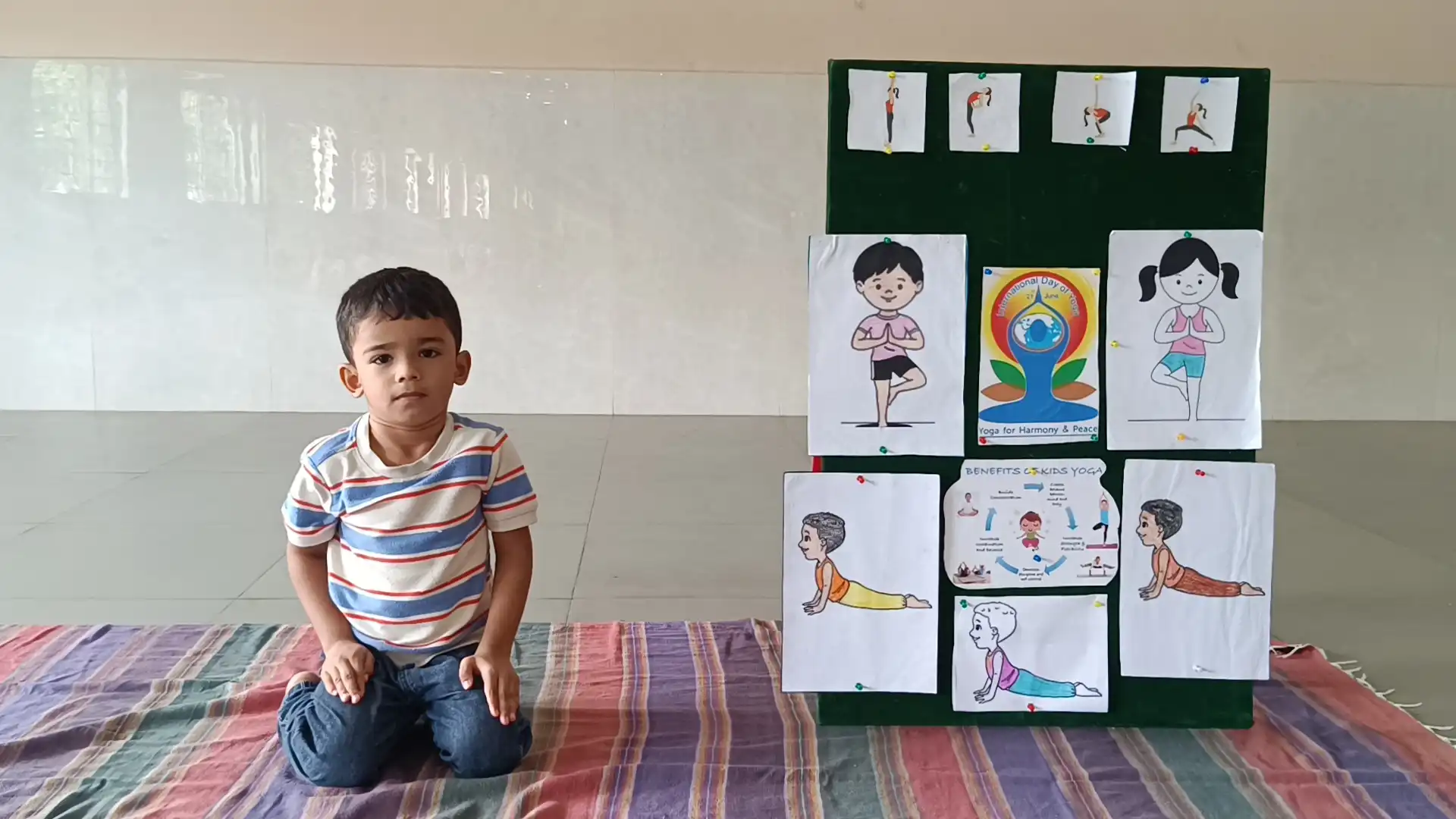 Children practicing yoga postures at Vidyodaya Public School