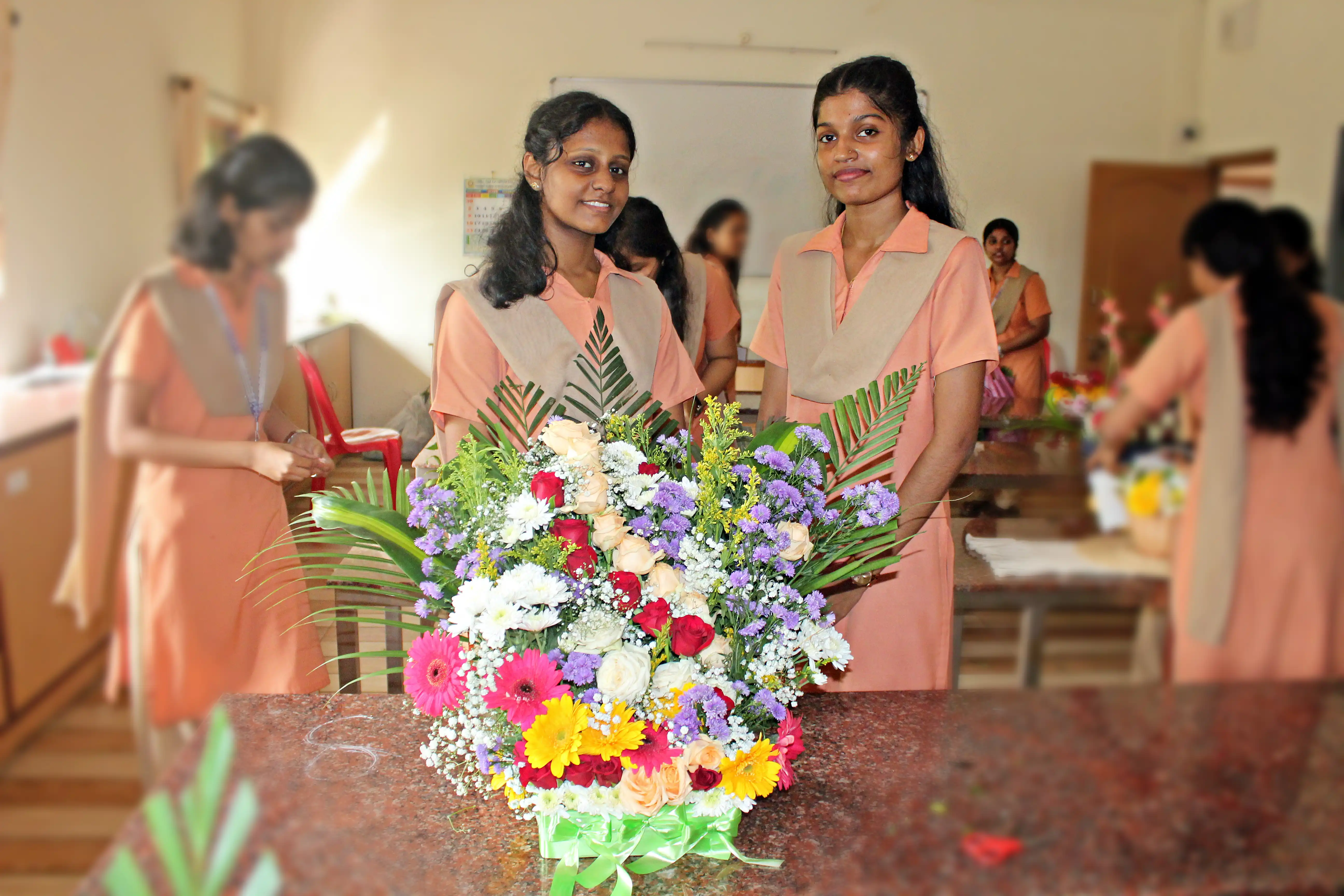 Colourful flowers arranged creatively by students