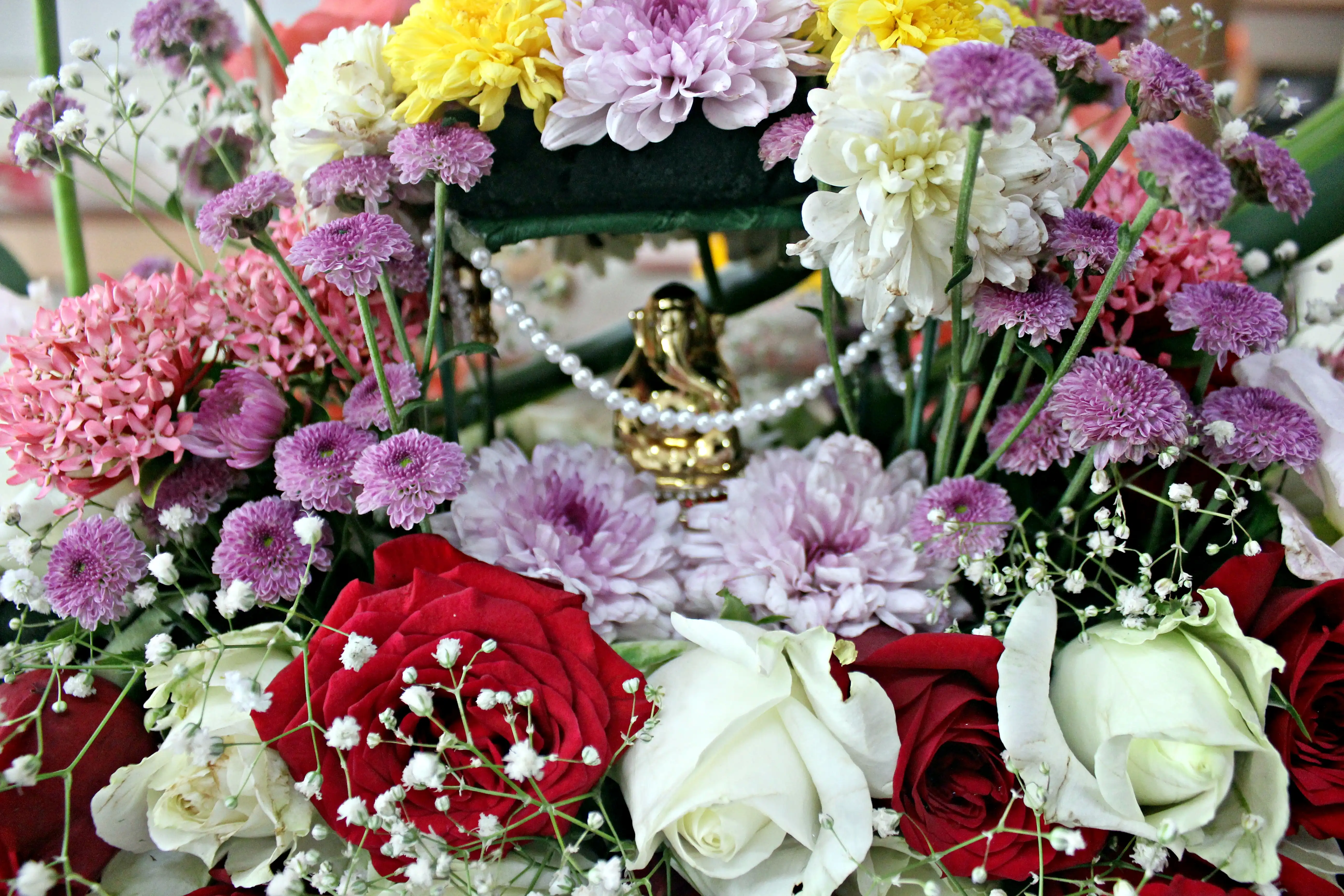 Colourful flowers arranged creatively by students