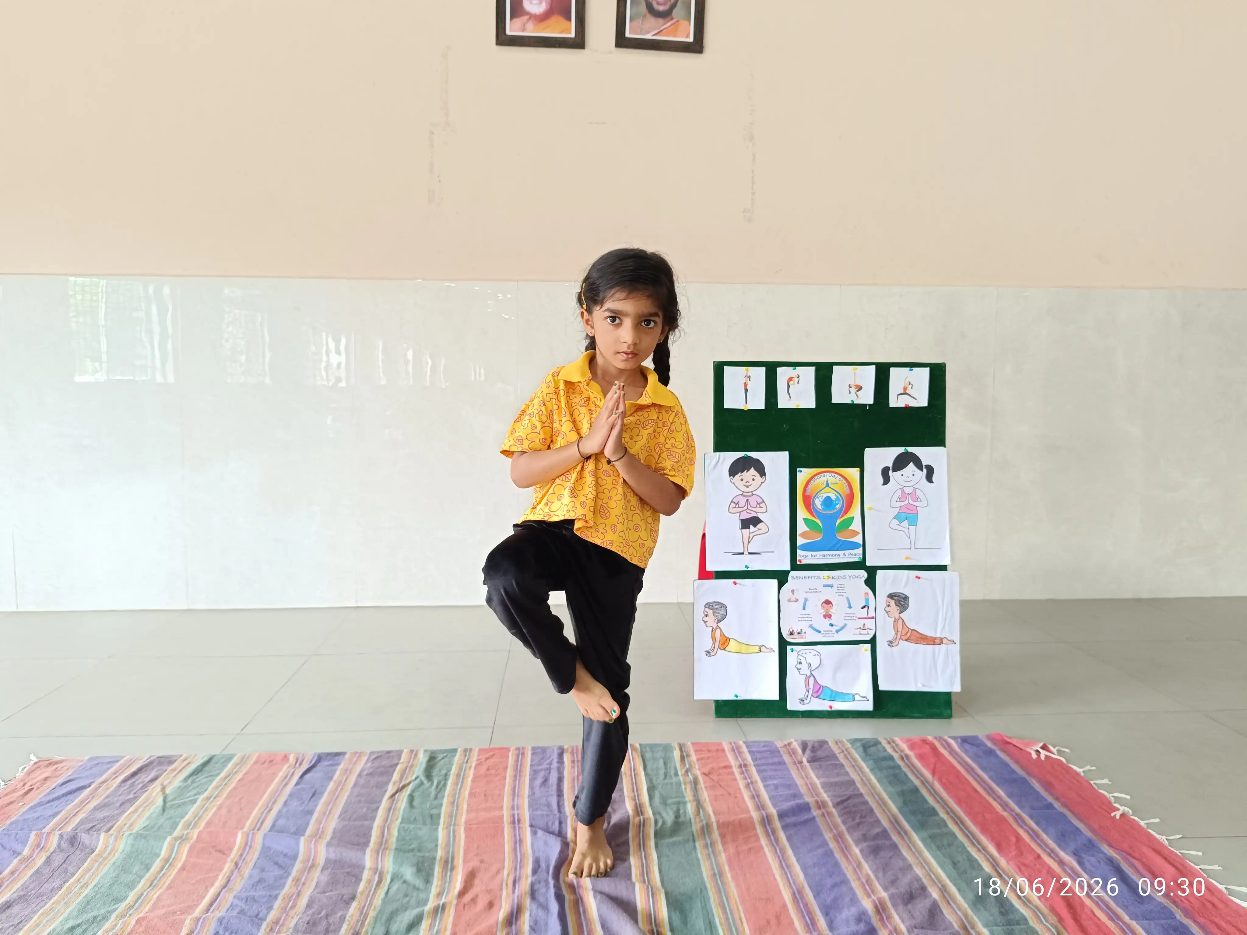 Children practicing yoga postures at Vidyodaya Public School