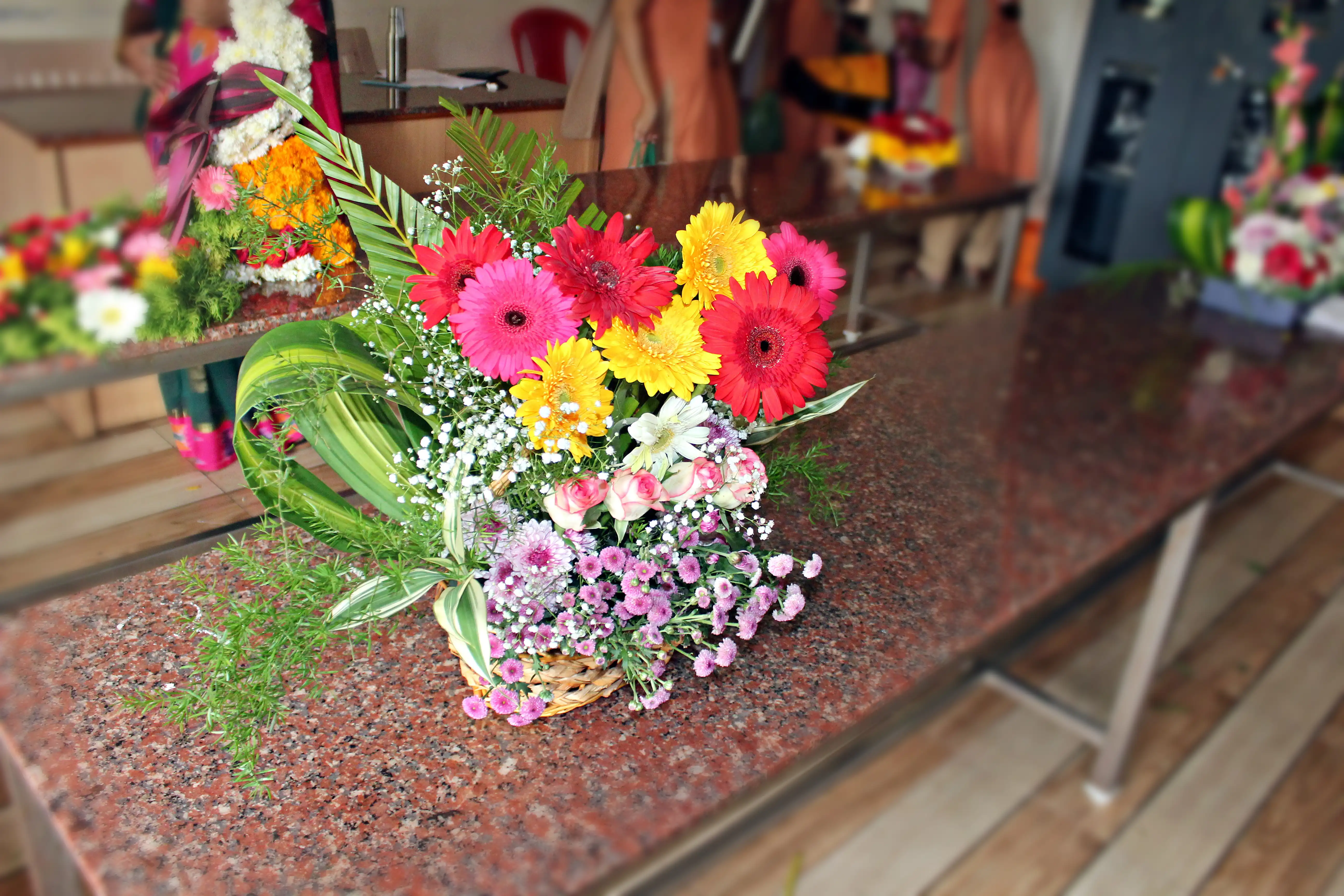 Colourful flowers arranged creatively by students