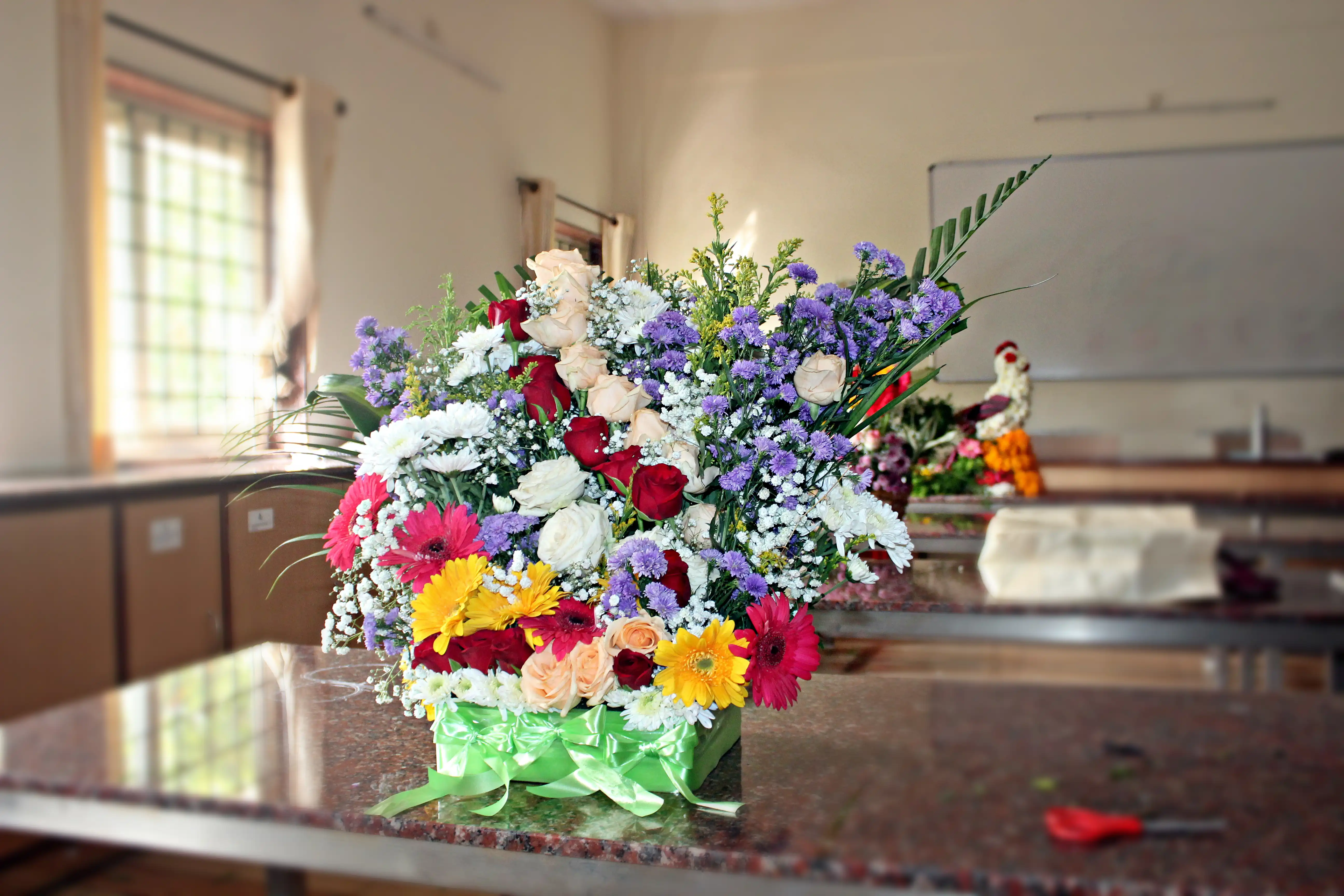 Colourful flowers arranged creatively by students
