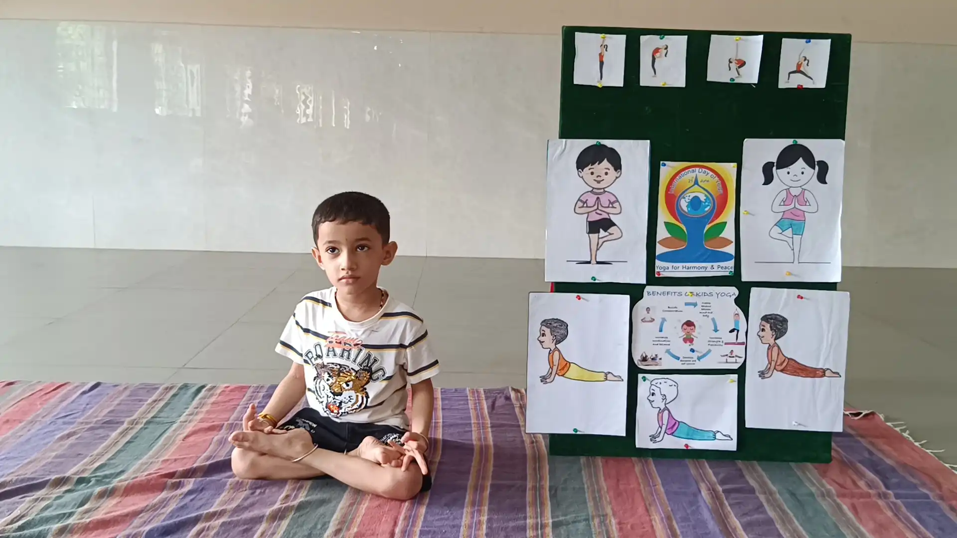 Children practicing yoga postures at Vidyodaya Public School