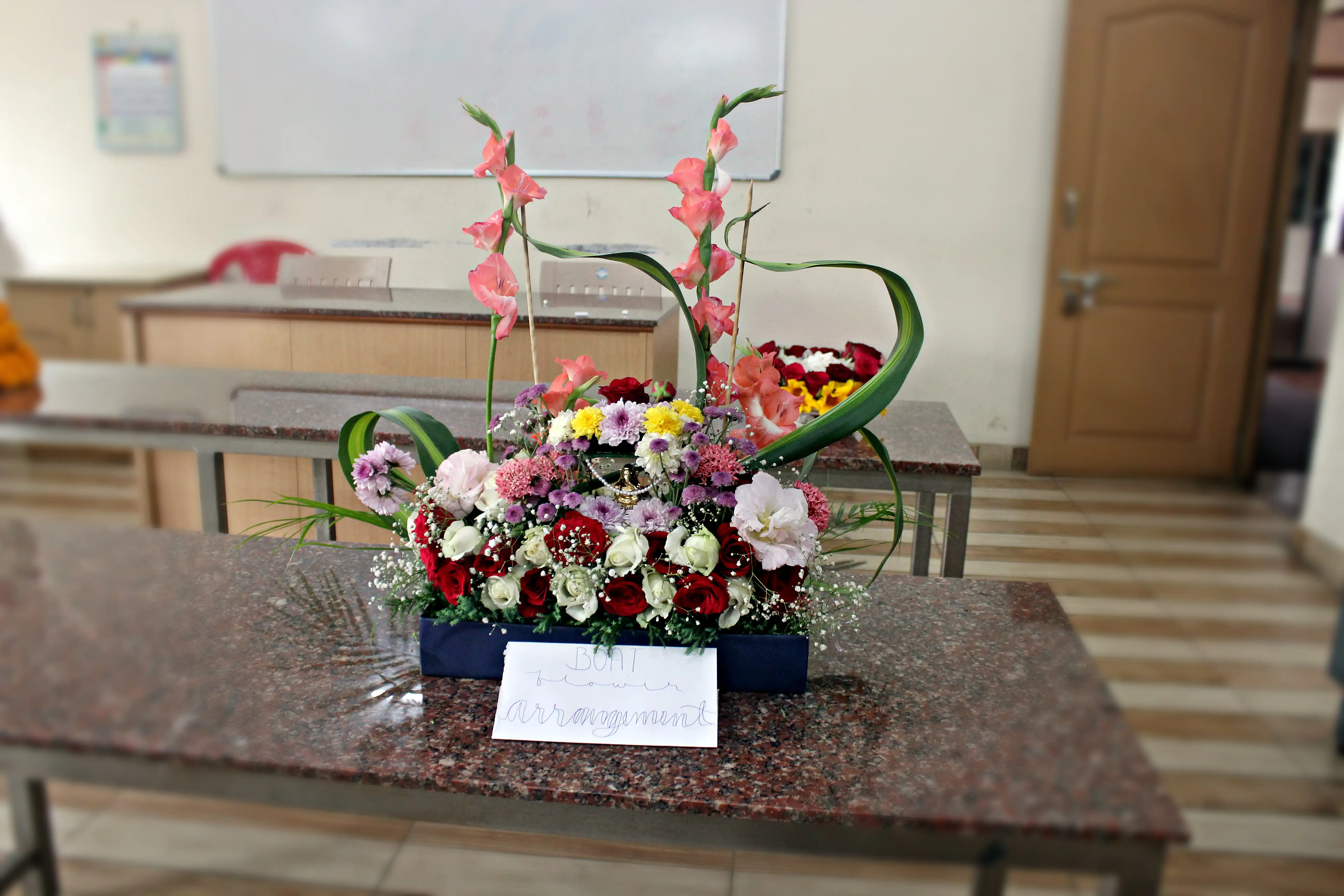 Colourful flowers arranged creatively by students