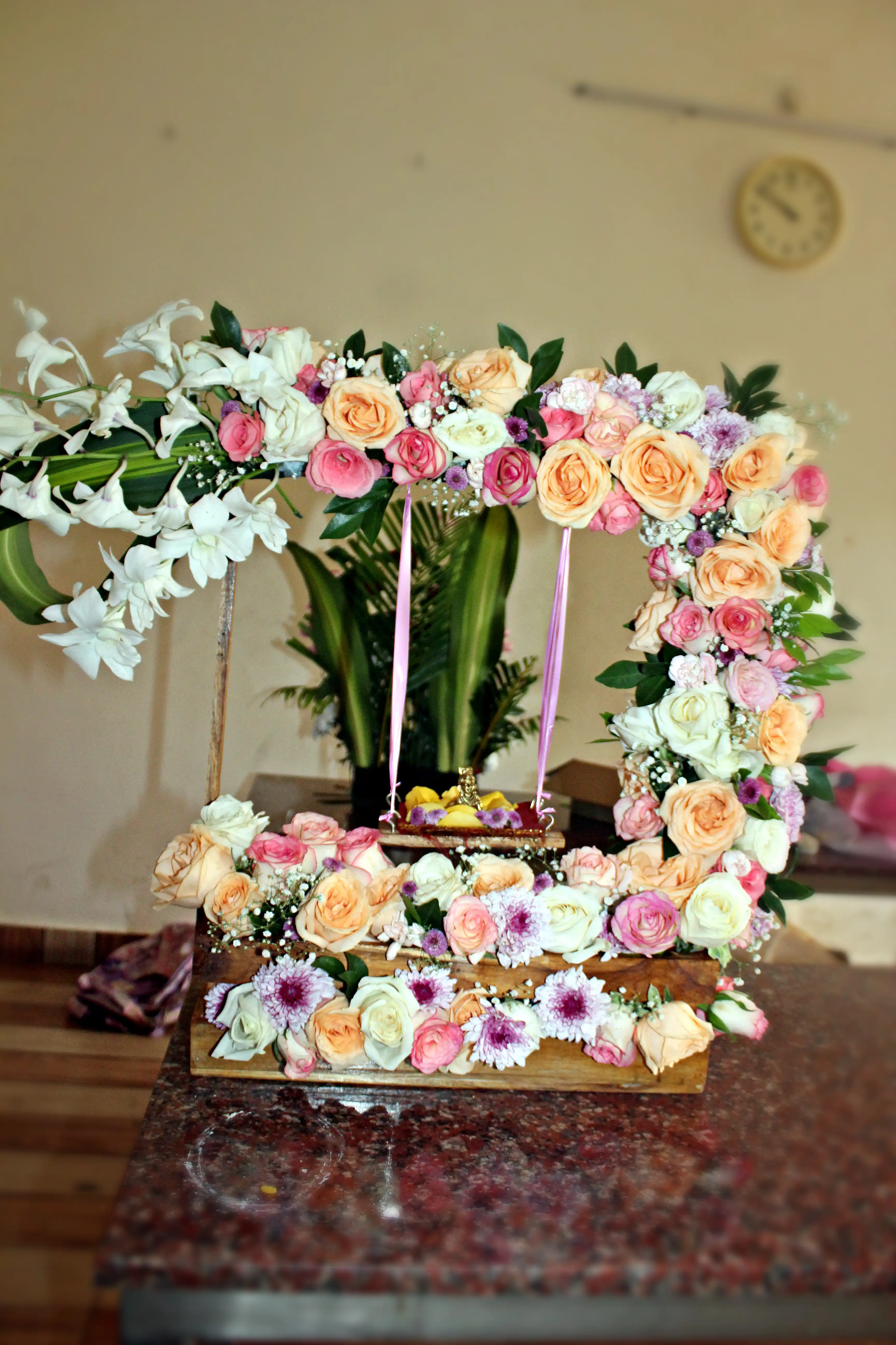 Colourful flowers arranged creatively by students