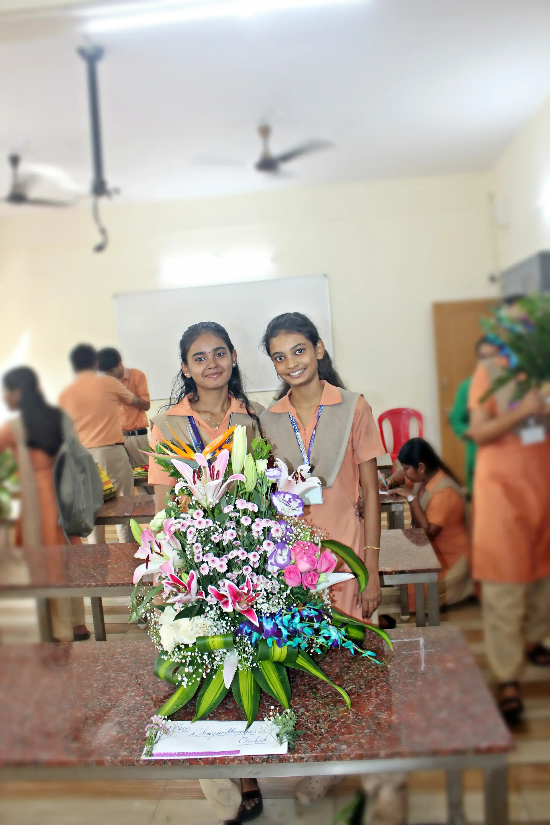 Students arranging flowers during the Flower Arrangement Competition