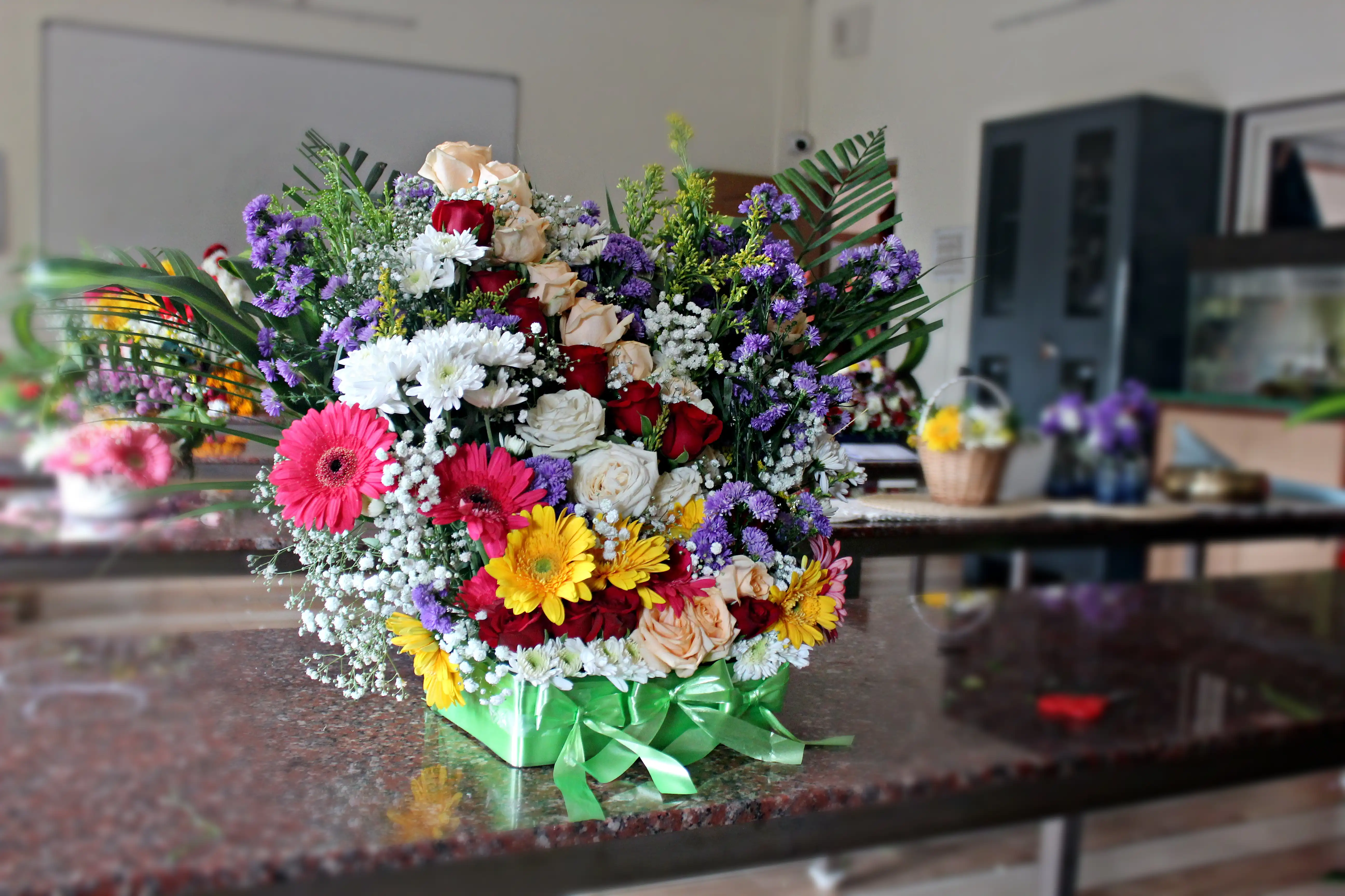 Colourful flowers arranged creatively by students