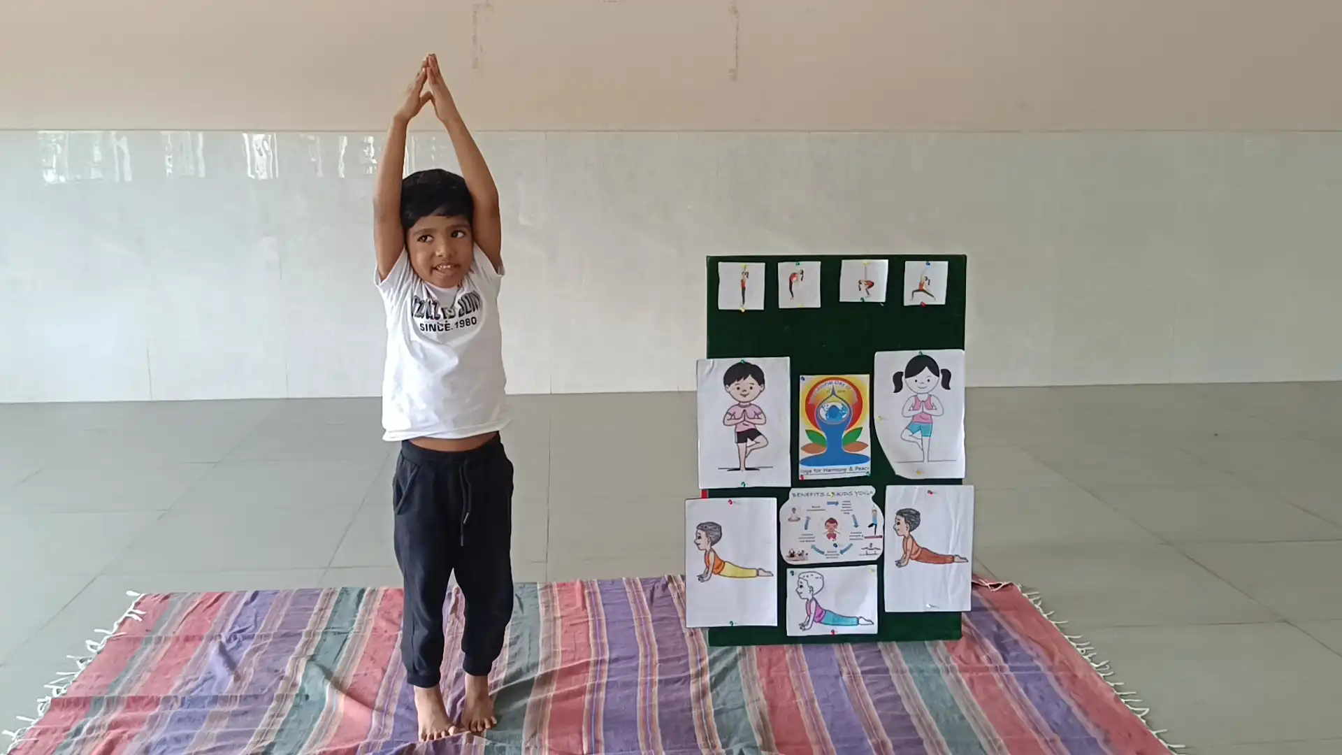 Children practicing yoga postures at Vidyodaya Public School