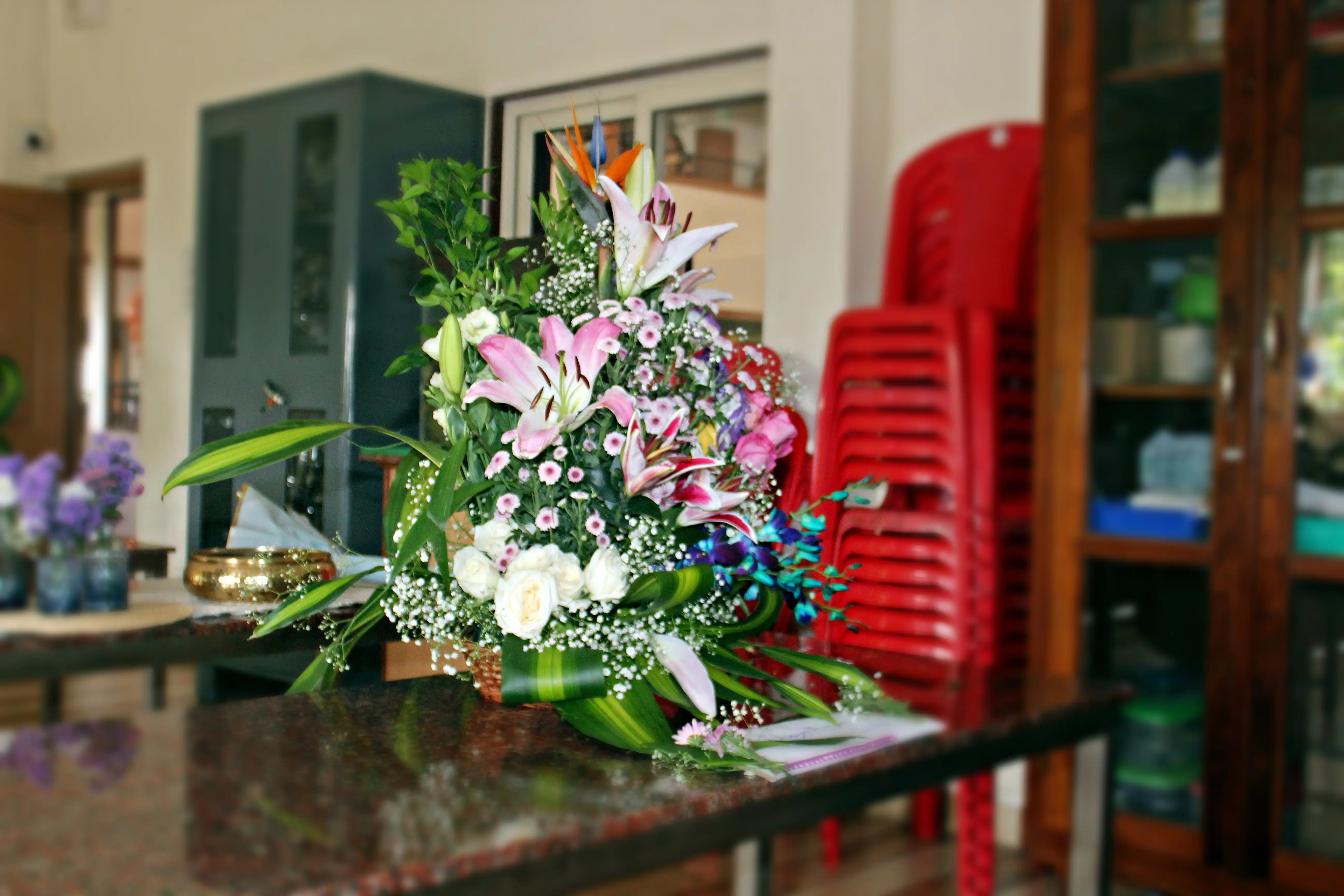 Colourful flowers arranged creatively by students